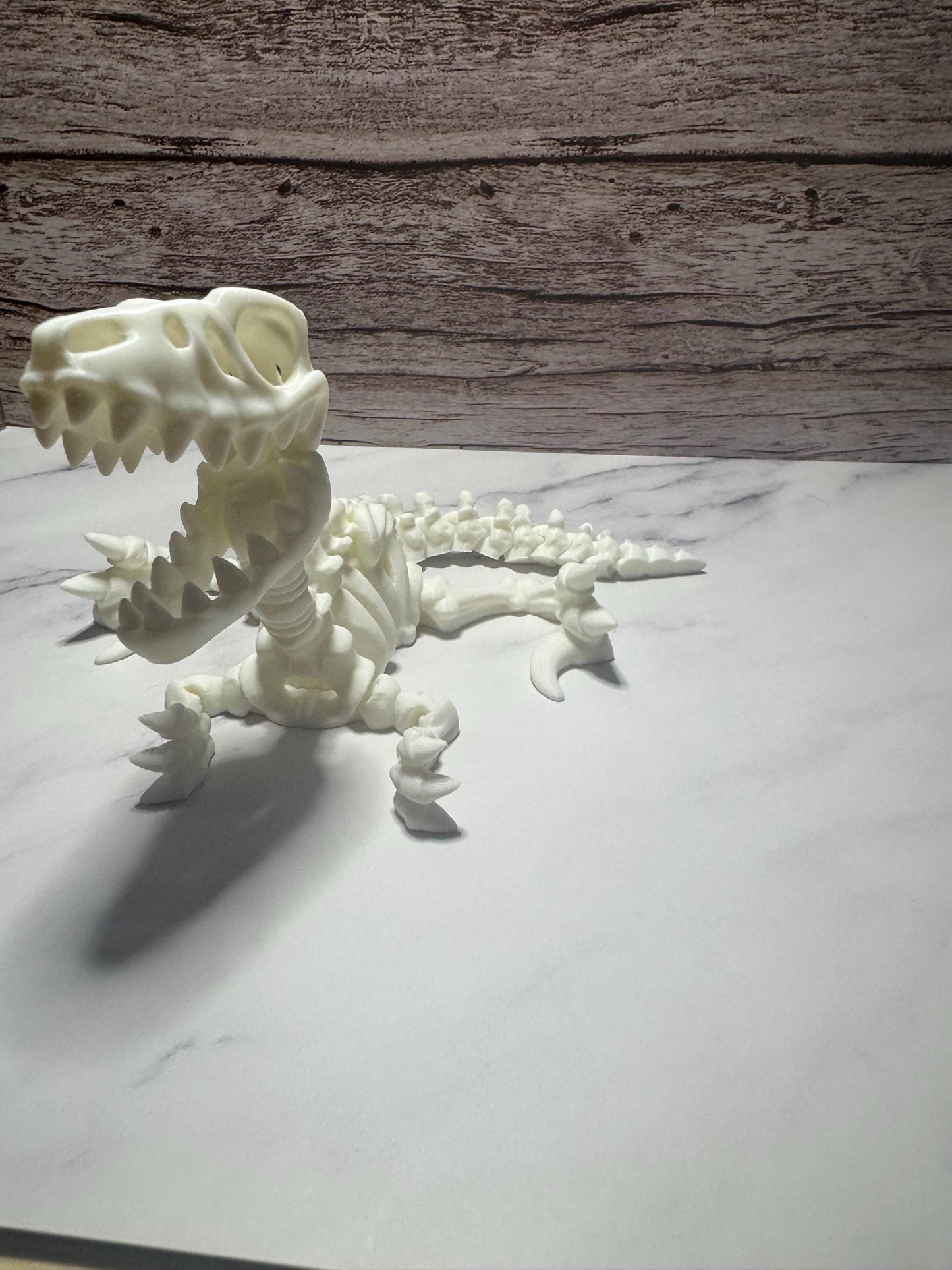 3D Printed Articulated Rainbow Raptor Skeleton: Desk Fidget Toy