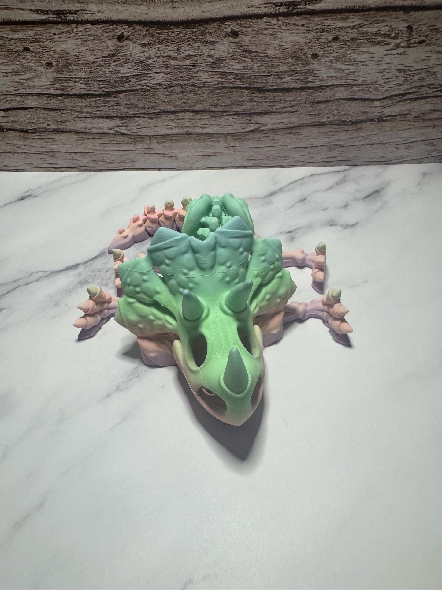 Articulated 3D Printed Triceratops Skeleton: Rainbow Flexi Dinosaur Toy & Prehistoric Model for Collectors