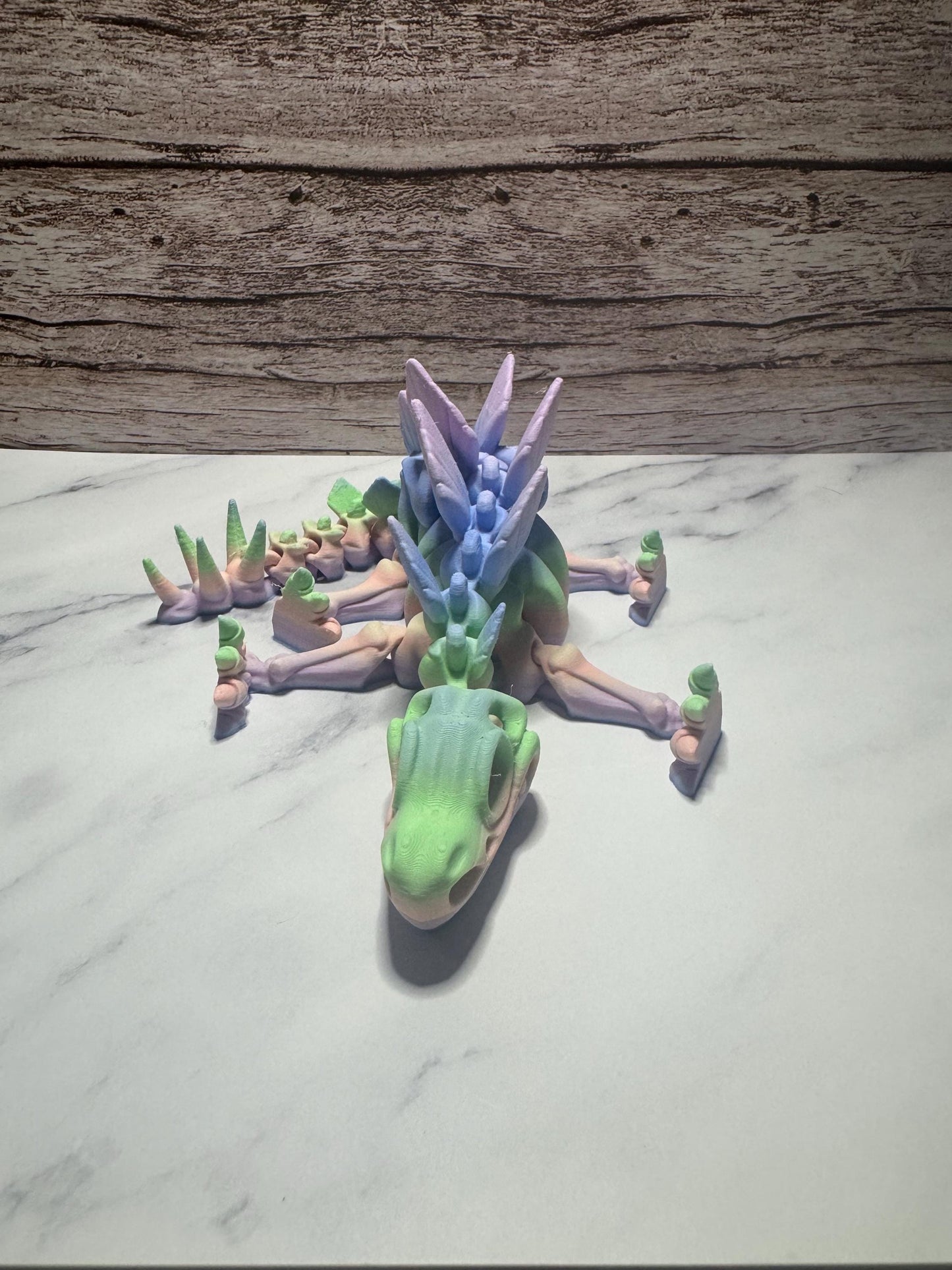 Articulated 3D Printed Stegosaurus Skeleton: Rainbow Flexi Dinosaur Toy for Prehistoric Enthusiasts