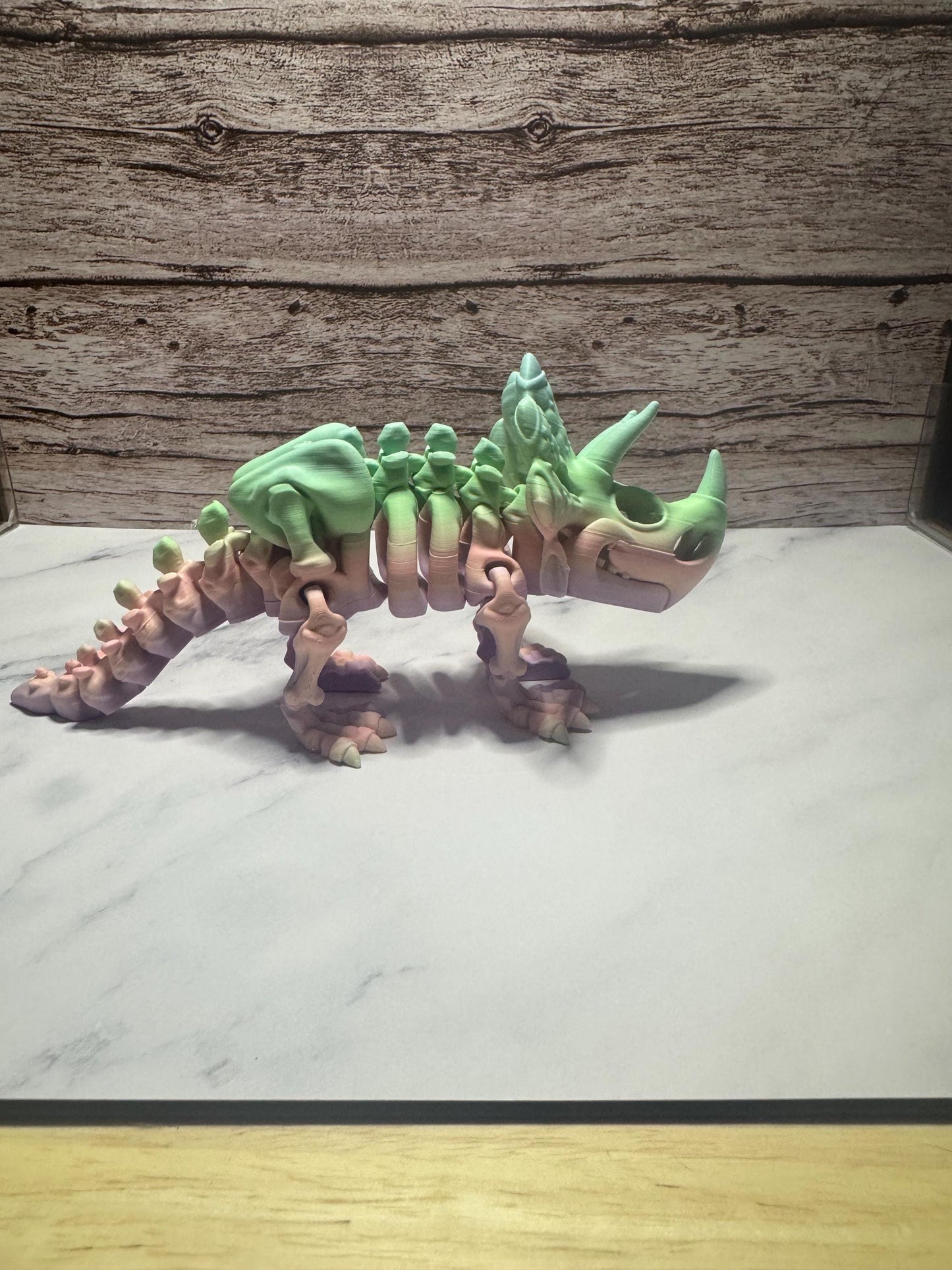 Articulated 3D Printed Triceratops Skeleton: Rainbow Flexi Dinosaur Toy & Prehistoric Model for Collectors